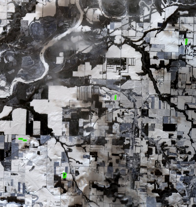 Detected manure spreads outlined in green on an aerial view of farmland